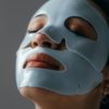 close up photo of a woman with facial mask
